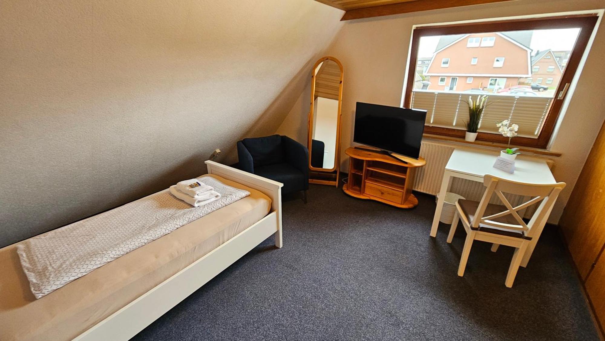 Hotel Dorfkrug Büsum - günstige Altbauzimmer Am Oland Zimmer foto